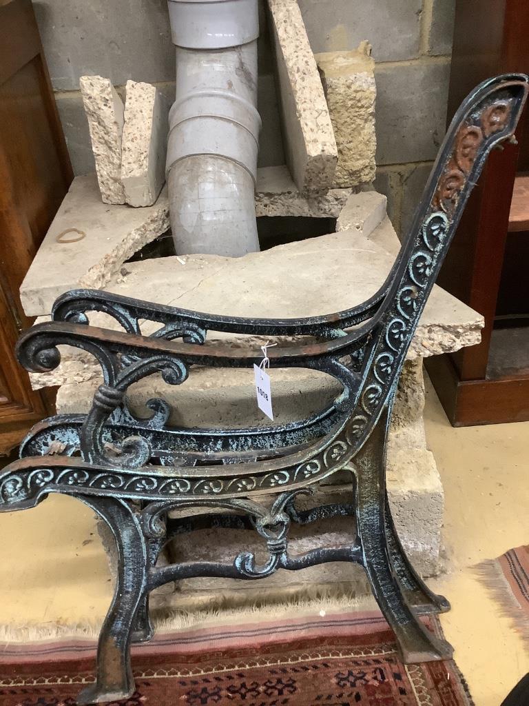 A cast iron garden seat, approx. width 68cm